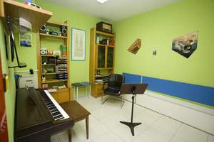 Aula de piano e instrumentos de viento